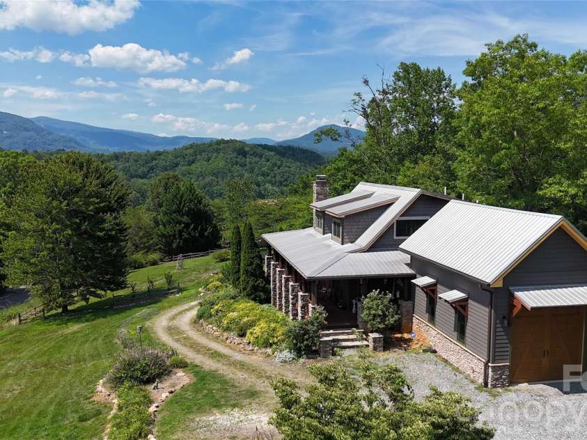 301 Peaks Drive, Lake Lure, NC 28746.  MLS# CAR4383996, YatesRealty ID 23717. Welcome home!