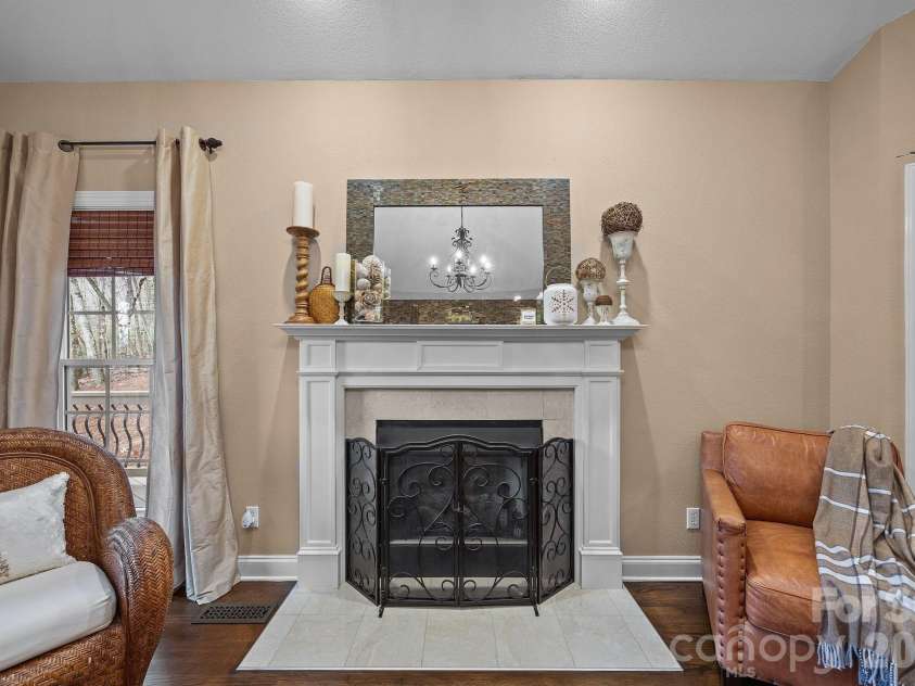 43 Smokemont Drive, Arden, NC 28704.  MLS# CAR4383229, YatesRealty ID 23718. At the end wall is a lovely fireplace.