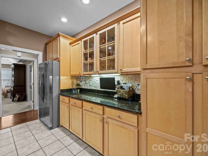 43 Smokemont Drive, Arden, NC 28704.  MLS# CAR4383229, YatesRealty ID 23718. Lovely maple cabinets.