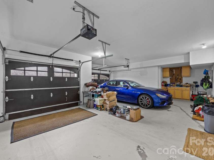 43 Smokemont Drive, Arden, NC 28704.  MLS# CAR4383229, YatesRealty ID 23718. Spacious attached 2-car garage with sealed floors.