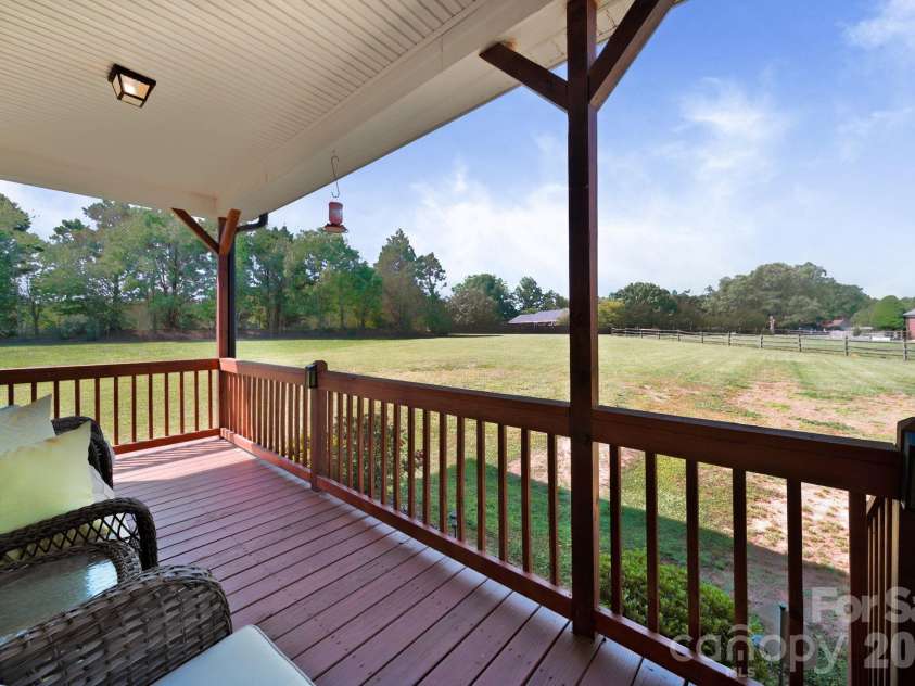 2318 Cardinal Ridge Lane, Wingate, NC 28174.  MLS# CAR4383638, YatesRealty ID 23719. Rear Porch