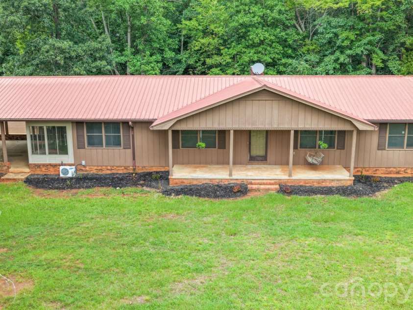 390 Low Water Bridge Road, Troy, NC 27371.  MLS# CAR4383693, YatesRealty ID 23720. 