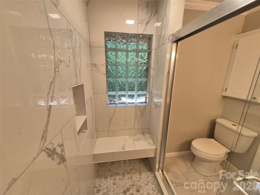 390 Low Water Bridge Road, Troy, NC 27371.  MLS# CAR4383693, YatesRealty ID 23720. En Suite Bathroom
