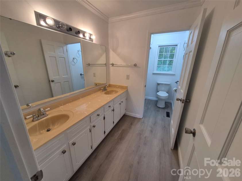 390 Low Water Bridge Road, Troy, NC 27371.  MLS# CAR4383693, YatesRealty ID 23720. Full Bath - Hallway