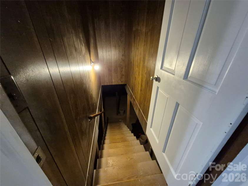 390 Low Water Bridge Road, Troy, NC 27371.  MLS# CAR4383693, YatesRealty ID 23720. Interior Basement Entry