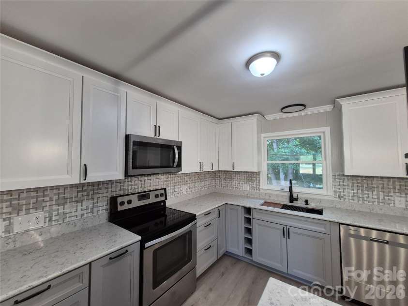 390 Low Water Bridge Road, Troy, NC 27371.  MLS# CAR4383693, YatesRealty ID 23720. Kitchen