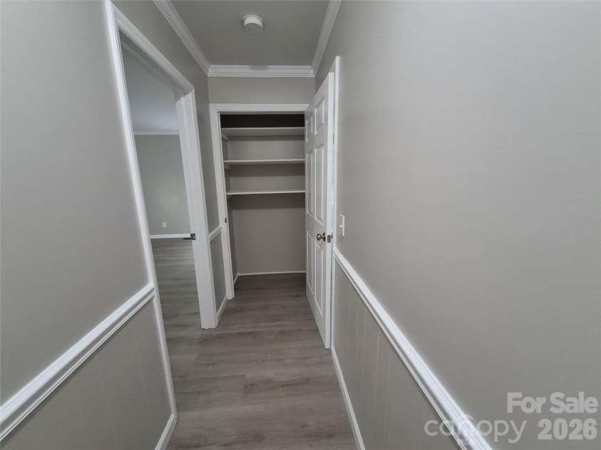 390 Low Water Bridge Road, Troy, NC 27371.  MLS# CAR4383693, YatesRealty ID 23720. Main Hall Closet
