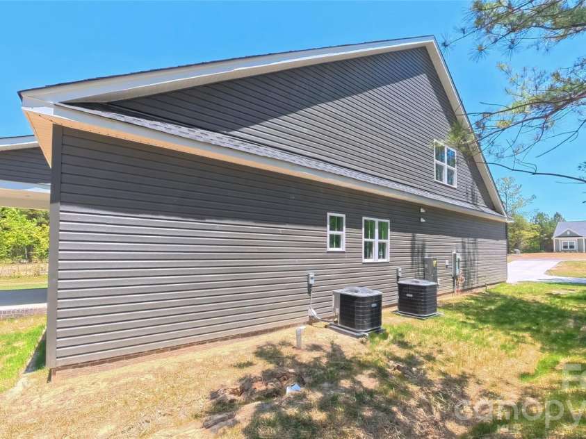 3099 Meadowcrest Drive, Clover, SC 29710.  MLS# CAR4384253, YatesRealty ID 23724. Left Side