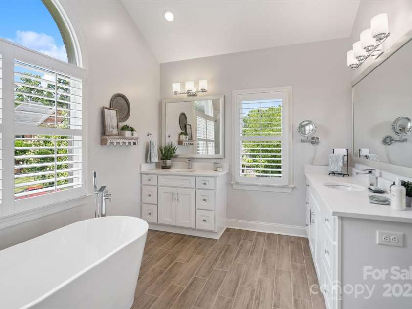 9027 Kirkley Court, Charlotte, NC 28277.  MLS# CAR4271257, YatesRealty ID 23728. Dual Vanities with Quarts Countertops, designer lighting