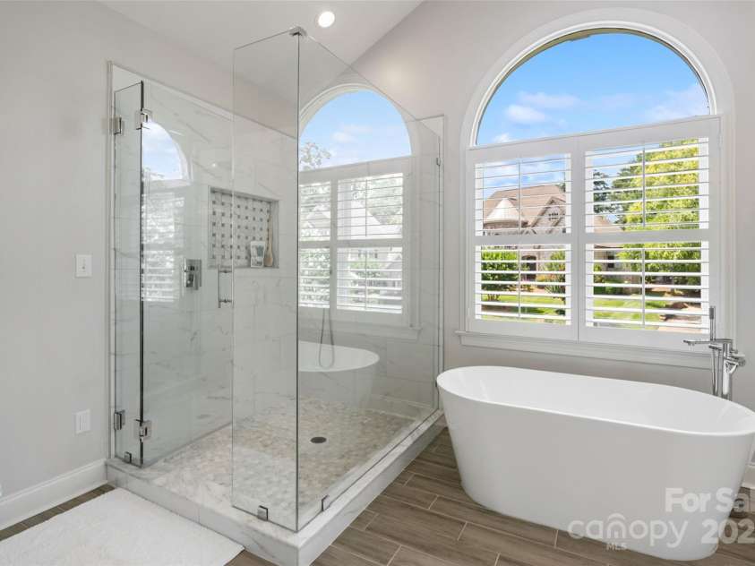 9027 Kirkley Court, Charlotte, NC 28277.  MLS# CAR4271257, YatesRealty ID 23728. Renovated Primary Bath with Soaking Tub & Oversized Shower