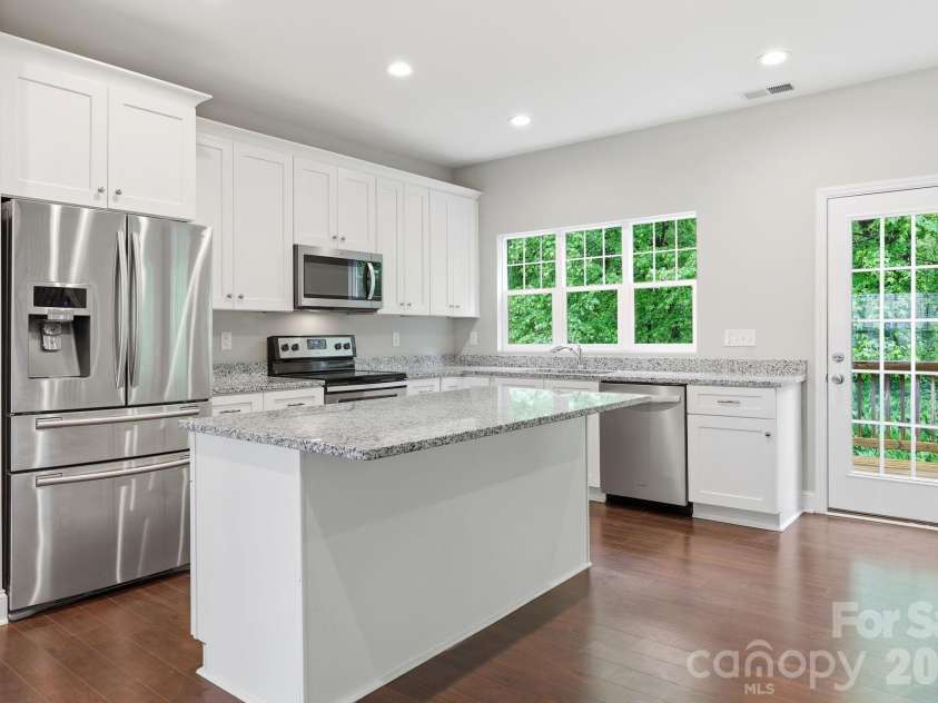 8207 Dumphries Drive, Huntersville, NC 28078.  MLS# CAR4375881, YatesRealty ID 23734. 