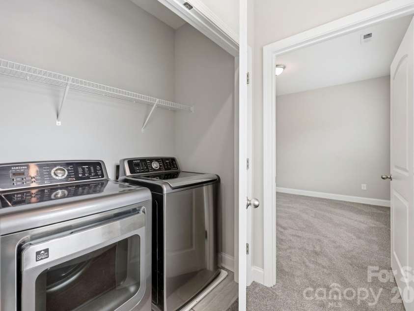 8207 Dumphries Drive, Huntersville, NC 28078.  MLS# CAR4375881, YatesRealty ID 23734. 