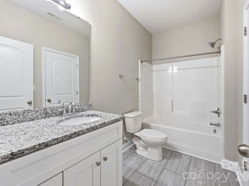 8207 Dumphries Drive, Huntersville, NC 28078.  MLS# CAR4375881, YatesRealty ID 23734. 
