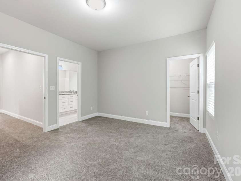 8207 Dumphries Drive, Huntersville, NC 28078.  MLS# CAR4375881, YatesRealty ID 23734. 