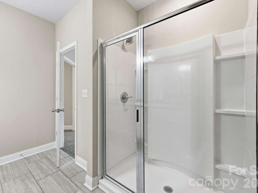 8207 Dumphries Drive, Huntersville, NC 28078.  MLS# CAR4375881, YatesRealty ID 23734. 