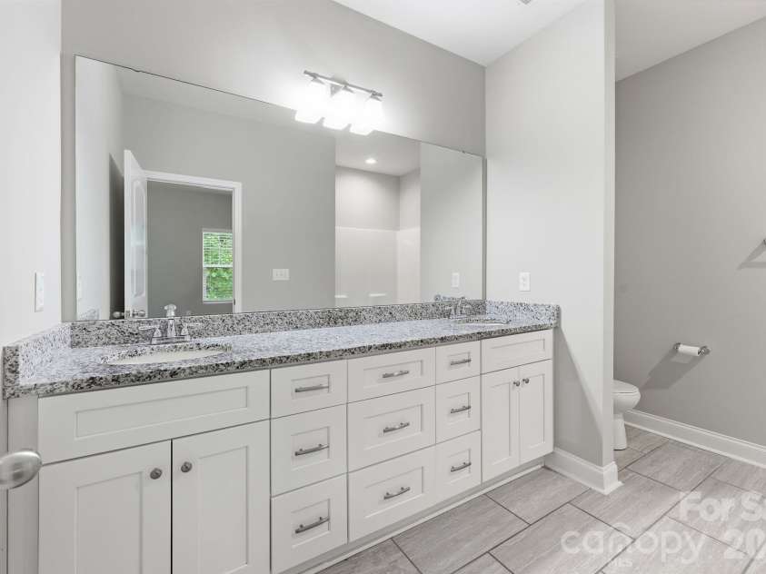 8207 Dumphries Drive, Huntersville, NC 28078.  MLS# CAR4434766, YatesRealty ID 23734. 