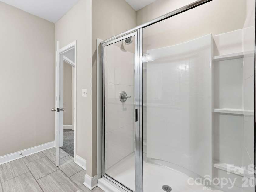 8207 Dumphries Drive, Huntersville, NC 28078.  MLS# CAR4434766, YatesRealty ID 23734. 