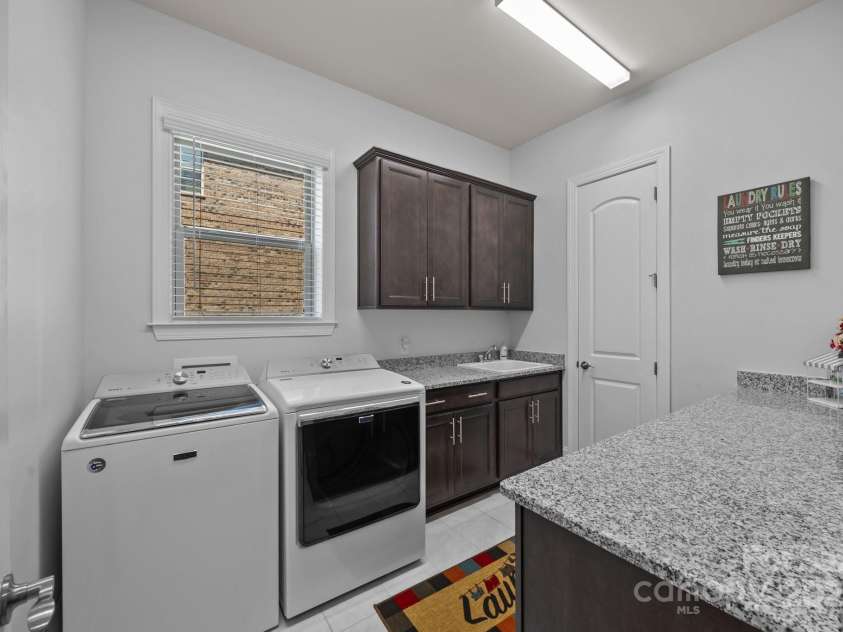 10904 Kilkenny Drive, Matthews, NC 28105.  MLS# CAR4242460, YatesRealty ID 23738. Laundry