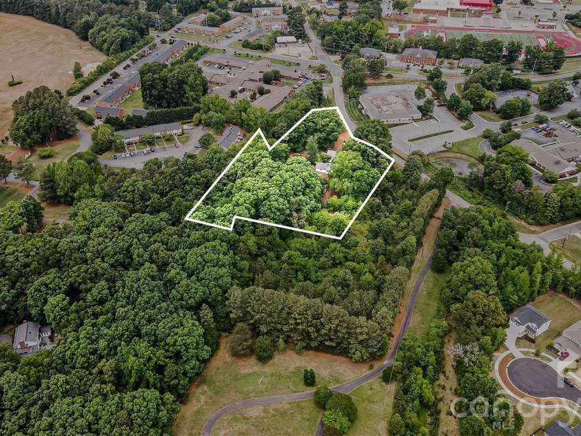 1116 Medlin Road, Monroe, NC 28112.  MLS# CAR4378370, YatesRealty ID 23742. 2 parcels + home - *Lot lines are approximate - please verify as needed*