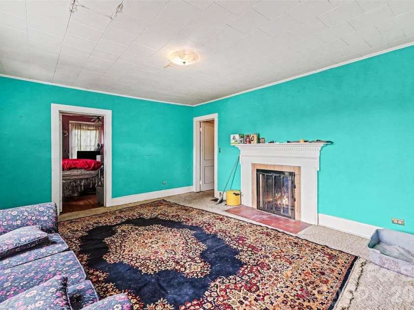 1116 Medlin Road, Monroe, NC 28112.  MLS# CAR4378370, YatesRealty ID 23742. Formal Front Living Room