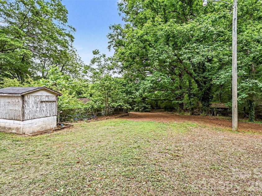 1116 Medlin Road, Monroe, NC 28112.  MLS# CAR4378370, YatesRealty ID 23742. Storage Building