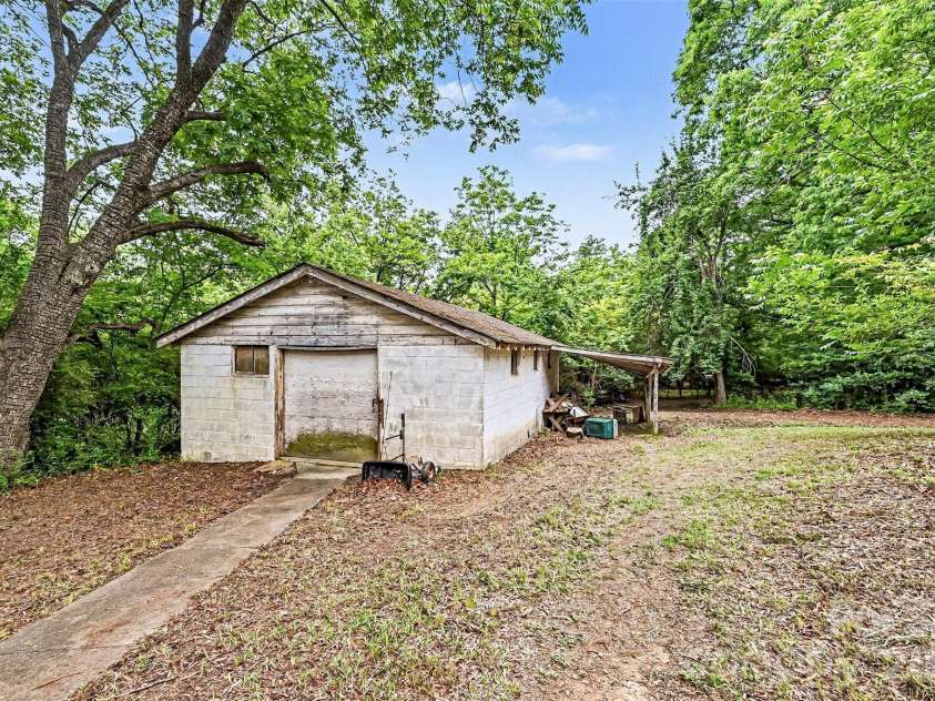 1116 Medlin Road, Monroe, NC 28112.  MLS# CAR4378370, YatesRealty ID 23742. Storage Building