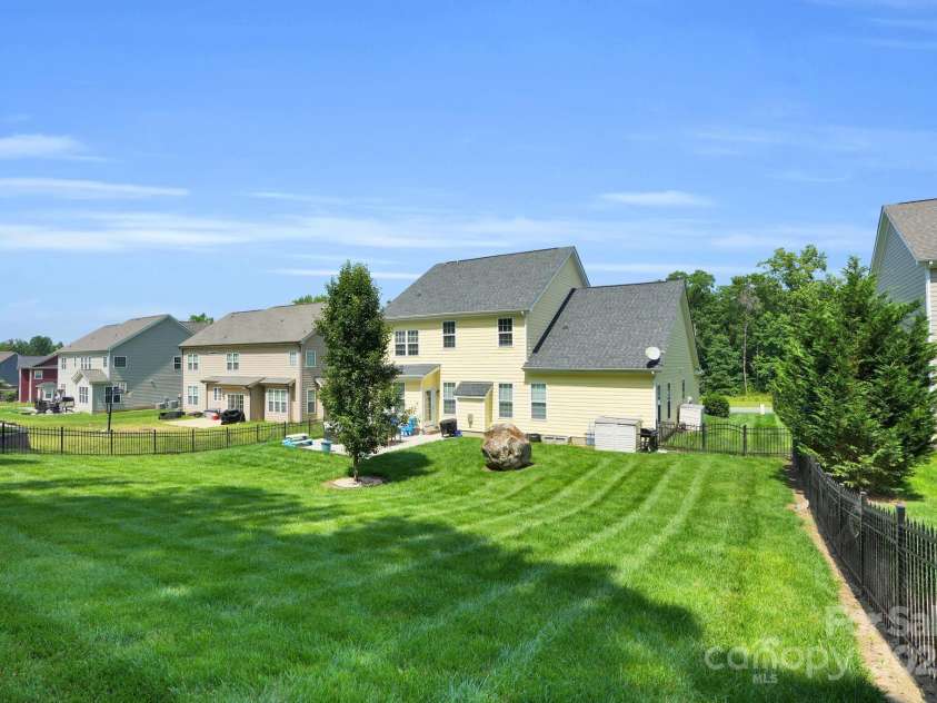 11618 Macallano Drive, Charlotte, NC 28215.  MLS# CAR4268252, YatesRealty ID 23742. Backyard