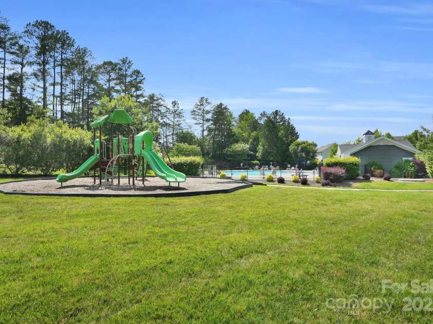 11618 Macallano Drive, Charlotte, NC 28215.  MLS# CAR4268252, YatesRealty ID 23742. Community playground & pool
