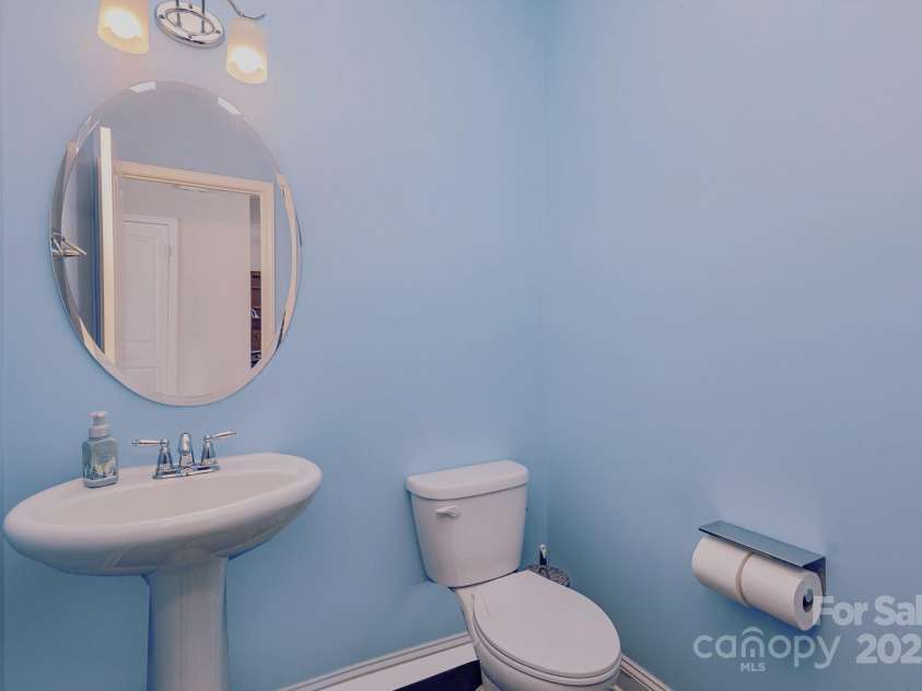 11618 Macallano Drive, Charlotte, NC 28215.  MLS# CAR4268252, YatesRealty ID 23742. Downstairs half bath