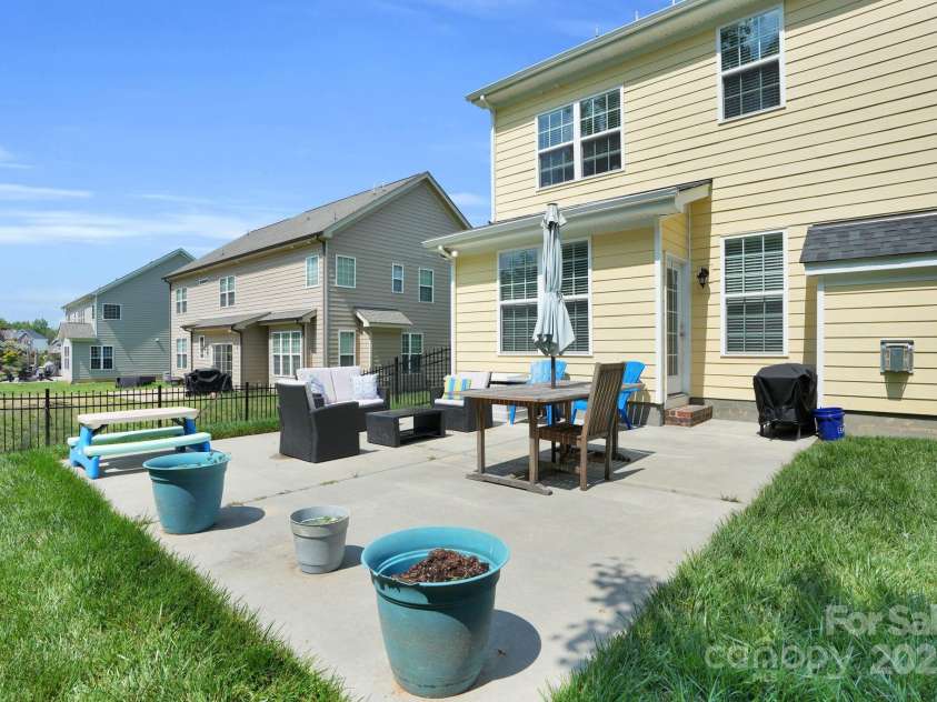 11618 Macallano Drive, Charlotte, NC 28215.  MLS# CAR4268252, YatesRealty ID 23742. Oversized concrete patio