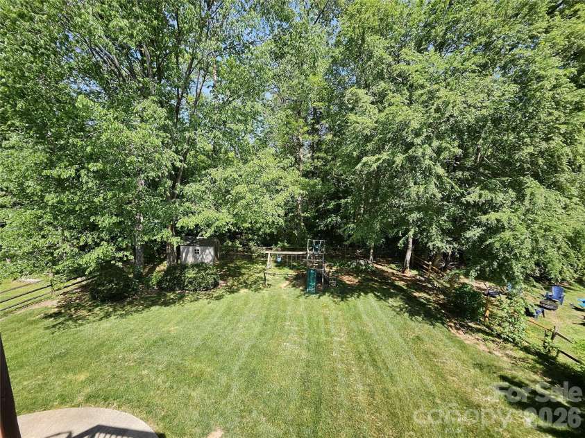 11632 Long Forest Drive, Charlotte, NC 28269.  MLS# CAR4369934, YatesRealty ID 23743. Back yard