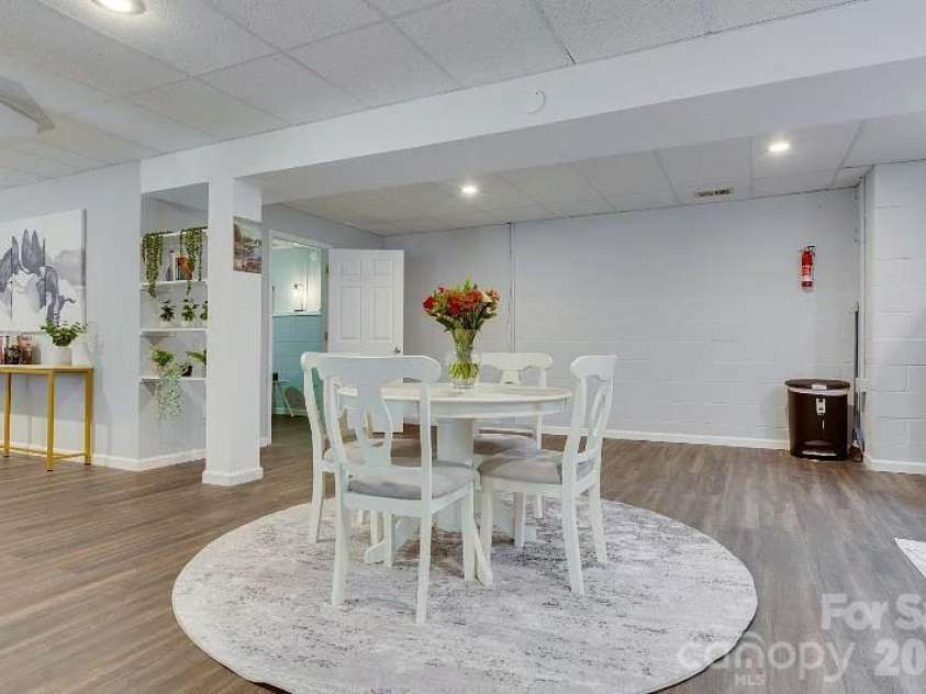 11632 Long Forest Drive, Charlotte, NC 28269.  MLS# CAR4369934, YatesRealty ID 23743. Basement Dining