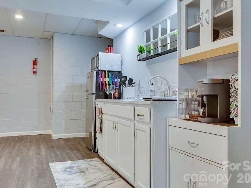 11632 Long Forest Drive, Charlotte, NC 28269.  MLS# CAR4369934, YatesRealty ID 23743. Basement Kitchenette