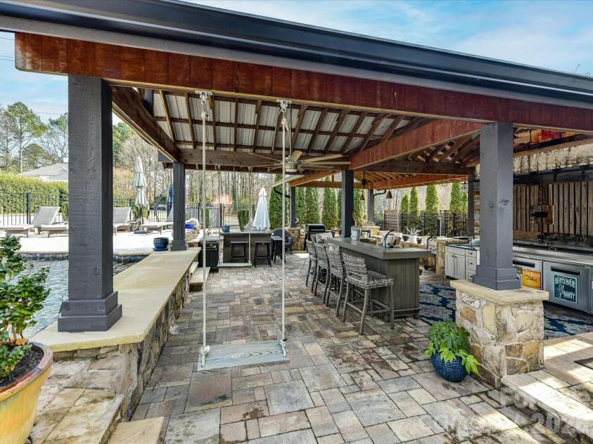 5401 Mountain Point Lane, Charlotte, NC 28216.  MLS# CAR4341424, YatesRealty ID 23753. Poolside Entertainment Area