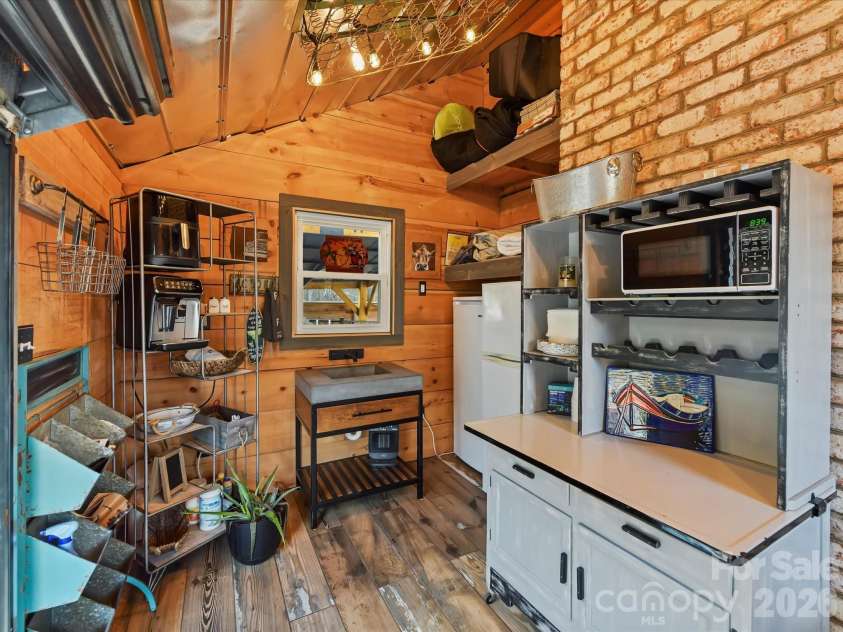 5401 Mountain Point Lane, Charlotte, NC 28216.  MLS# CAR4341424, YatesRealty ID 23753. Poolside Glamping Cabana