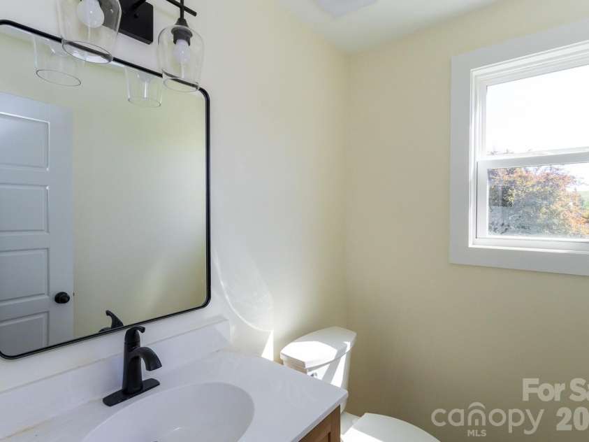 39 Terry Estates Drive, Black Mountain, NC 28711.  MLS# CAR4372396, YatesRealty ID 23756. 1/2 Bath Downstairs