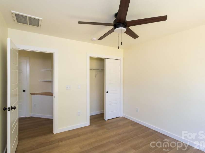 39 Terry Estates Drive, Black Mountain, NC 28711.  MLS# CAR4372396, YatesRealty ID 23756. Bedroom looking into hallway