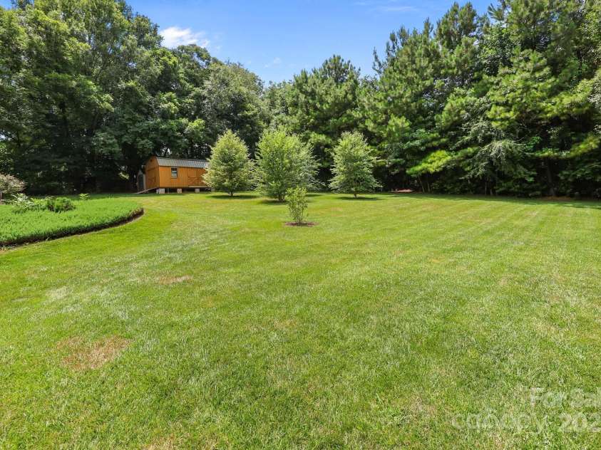 201 Ferry Street, New London, NC 28127.  MLS# CAR4275598, YatesRealty ID 23757. 