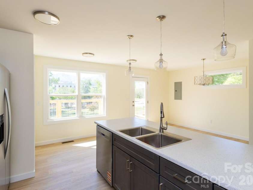 46 Vance Avenue, Black Mountain, NC 28711.  MLS# CAR4363726, YatesRealty ID 23757. Dining room from kitchen view