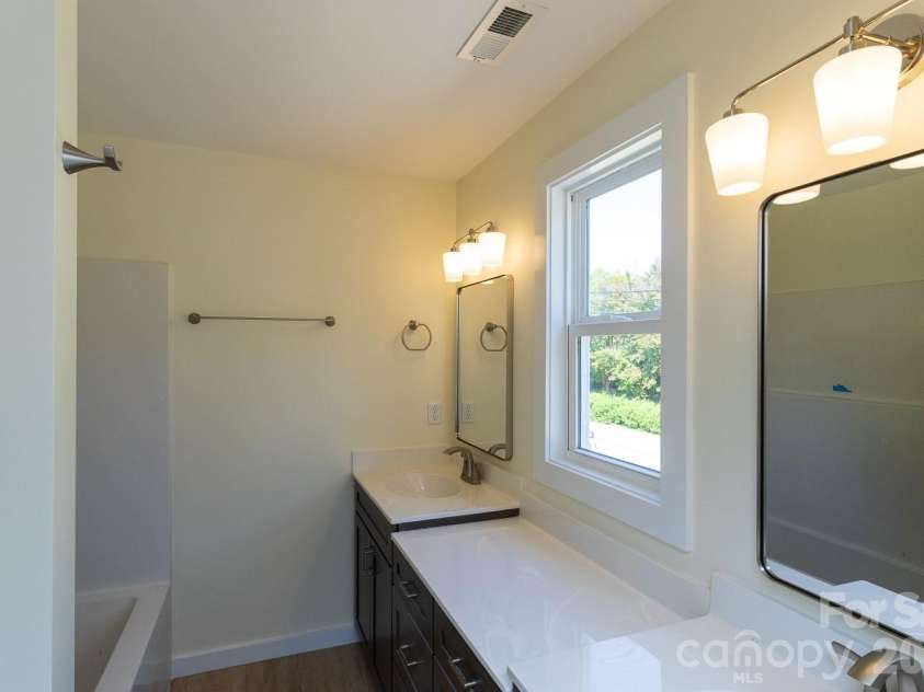 46 Vance Avenue, Black Mountain, NC 28711.  MLS# CAR4363726, YatesRealty ID 23757. Dual vanity Master bath