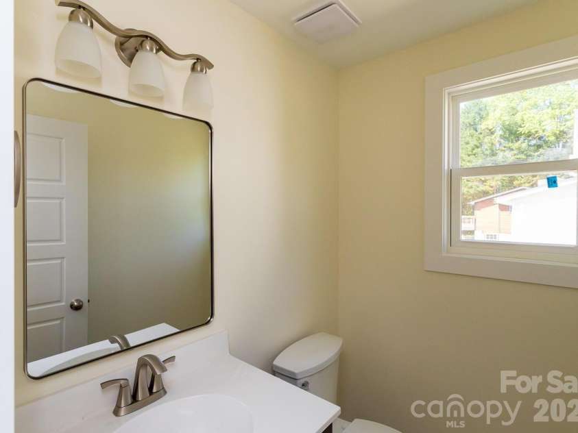 46 Vance Avenue, Black Mountain, NC 28711.  MLS# CAR4363726, YatesRealty ID 23757. Half Bath lower level