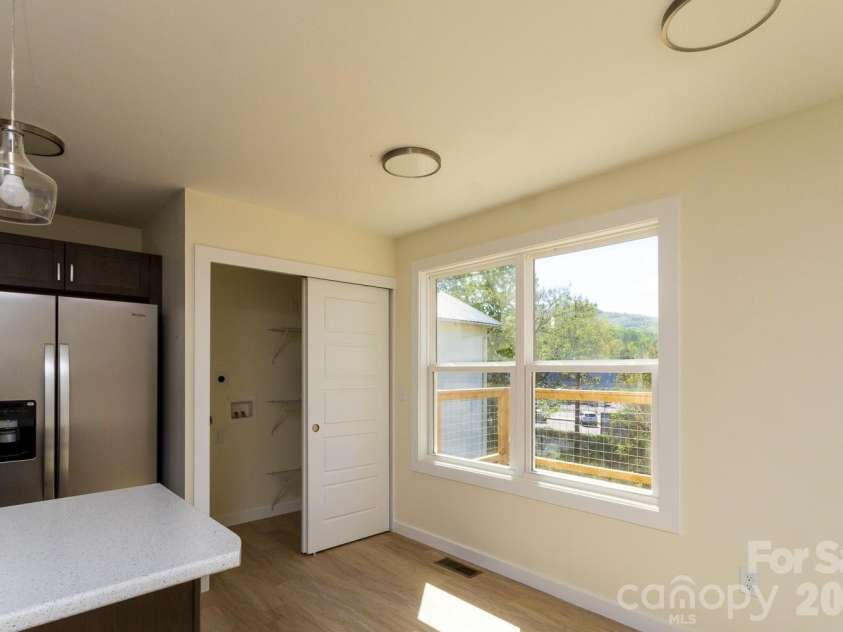 46 Vance Avenue, Black Mountain, NC 28711.  MLS# CAR4363726, YatesRealty ID 23757. Laundry closet