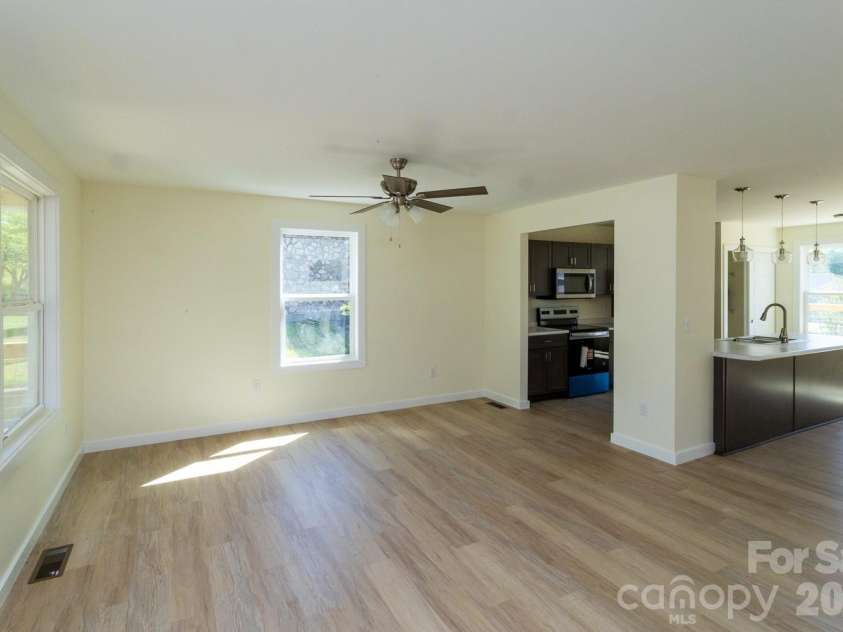 46 Vance Avenue, Black Mountain, NC 28711.  MLS# CAR4363726, YatesRealty ID 23757. Light and Bright Living room
