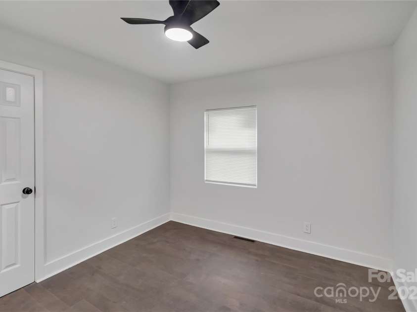1814 Eastway Drive, Charlotte, NC 28205.  MLS# CAR4239962, YatesRealty ID 23758. Bedroom 1 w/view of widow