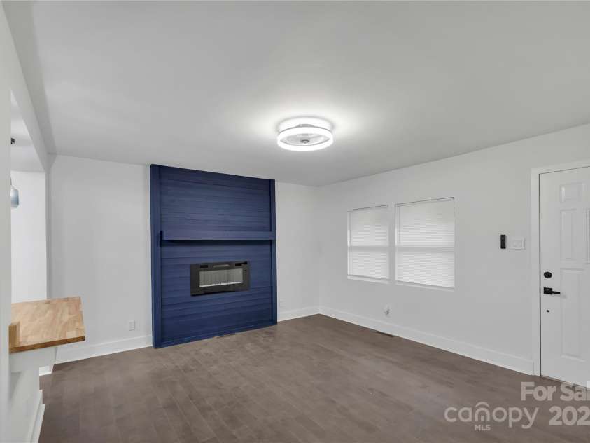 1814 Eastway Drive, Charlotte, NC 28205.  MLS# CAR4239962, YatesRealty ID 23758. Electric fireplace