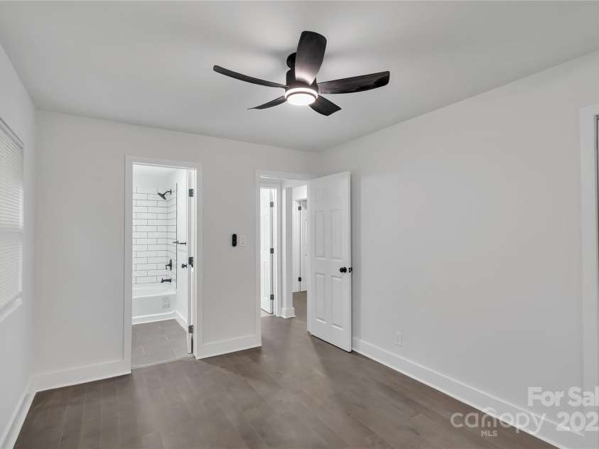 1814 Eastway Drive, Charlotte, NC 28205.  MLS# CAR4239962, YatesRealty ID 23758. Primary bedroom w/view of bathroom and entry way
