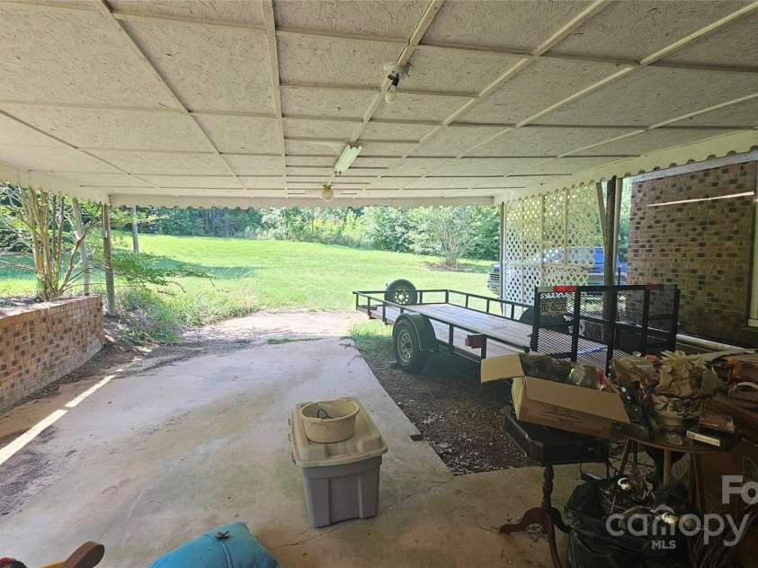 11056 US Highway 52 Highway, Wadesboro, NC 28170.  MLS# CAR4274105, YatesRealty ID 23759. Carport