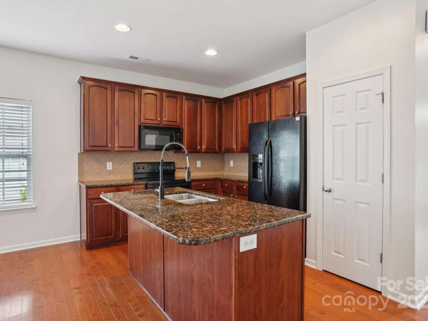 10303 Dominion Village Drive, Charlotte, NC 28269.  MLS# CAR4276725, YatesRealty ID 23760. 