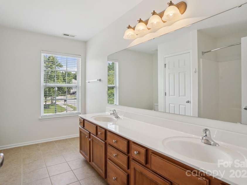 10303 Dominion Village Drive, Charlotte, NC 28269.  MLS# CAR4276725, YatesRealty ID 23760. 