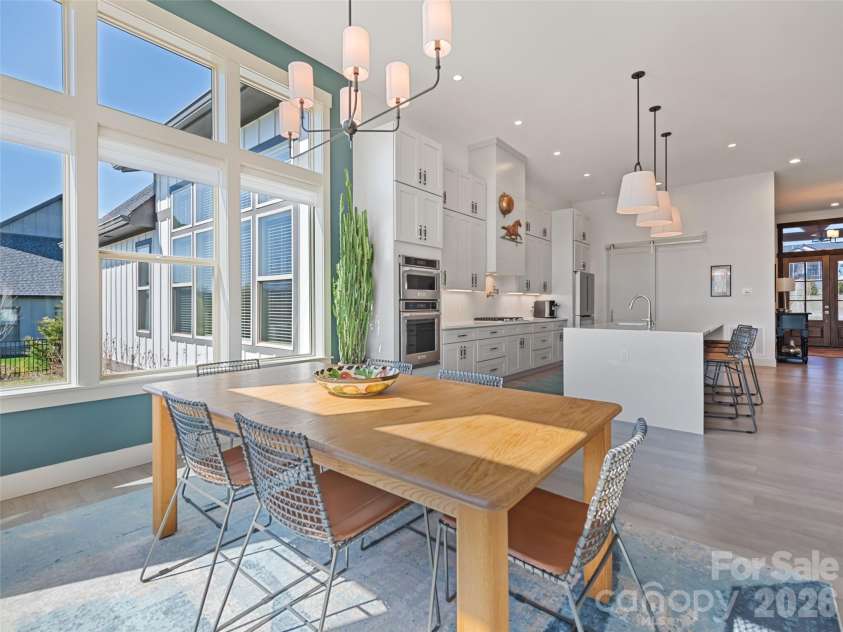 717 Daniel Circle Drive, Mills River, NC 28759.  MLS# CAR4355439, YatesRealty ID 23761. Another view of the spacious, naturally lit dining area beside kitchen